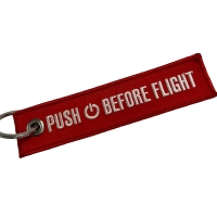 Schlüsselanhänger "PUSH BEFORE FLIGHT"
